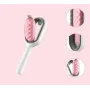 Щітка для вичісування шерсті хатніх тварин 4 в 1 Pet Cleaning Comb з масажем і чищенням речей Pink W28