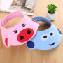 Дитячий регульований козирок для миття голови та стрижки Baby Shower Cap · Захисна шапочка для купання дитини
